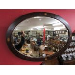 Oval bevelled glass wall mirror