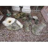 Assortment of stone garden ornaments