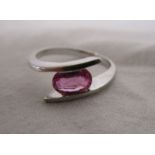 White gold pink topaz set ring