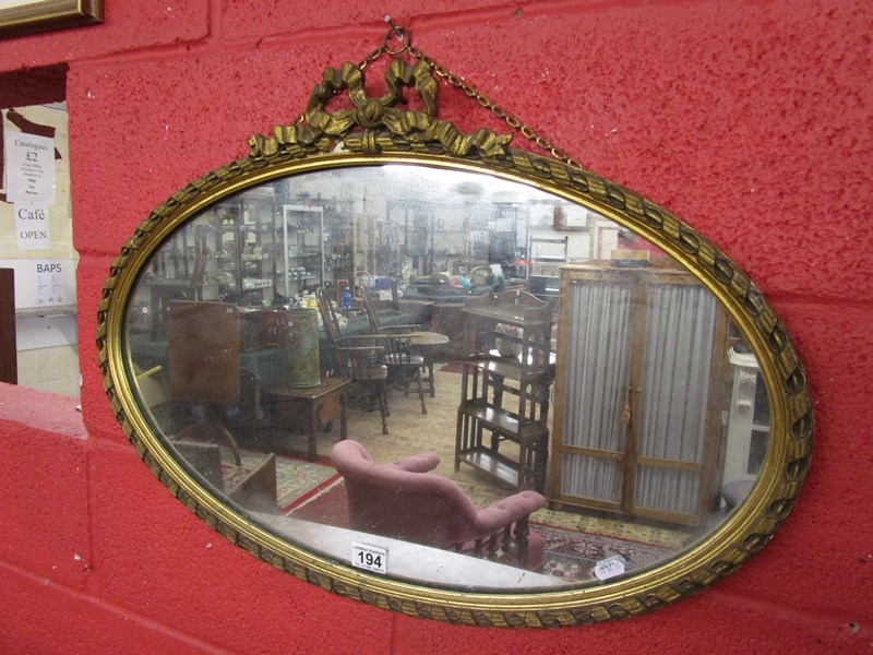 Oval gilt framed mirror