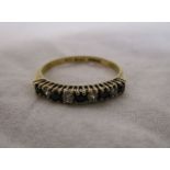 Gold sapphire half eternity ring