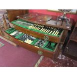 Large canteen of cutlery in mahogany 2 drawer table on castors - Approx H: 76cm x W: 92cm x d: 53cm