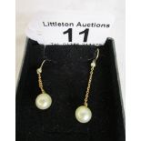 Pair of gold antique pearl drop earrings