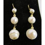 Pair of gold triple pearl drop earrings