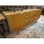 Mid century teak sideboard by Sutcliff (H: 76cm W: 183cm D: 45cm)