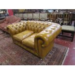 Mustard 2 seater button-back Chesterfield sofa