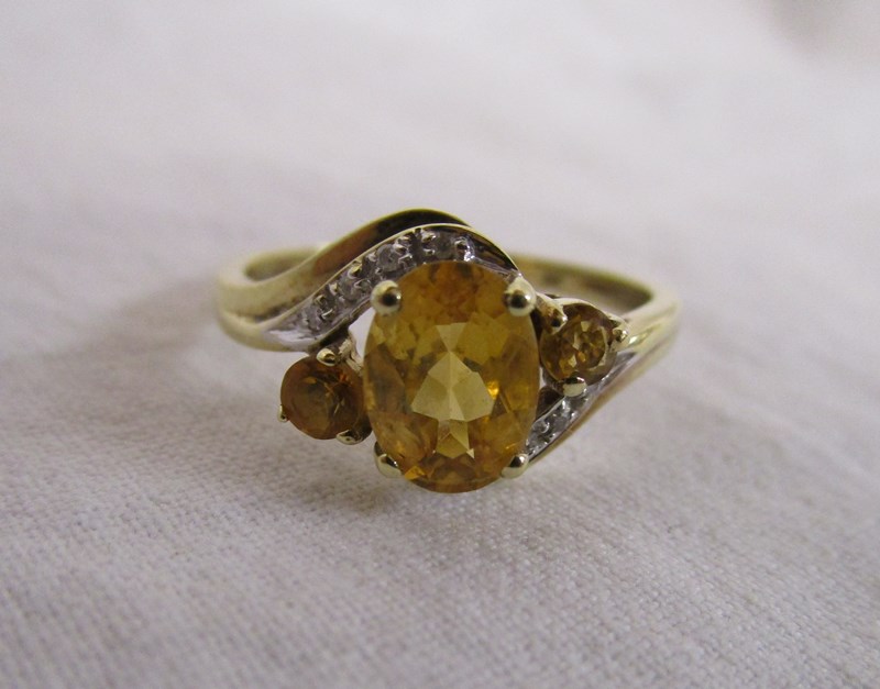 Gold citrine & diamond set ring