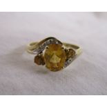 Gold citrine & diamond set ring