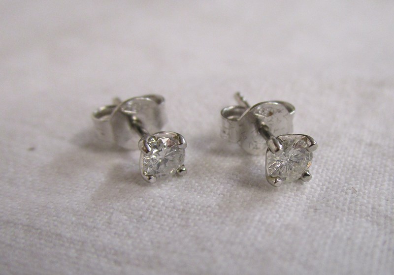 Pair of 18ct white gold diamond stud earrings