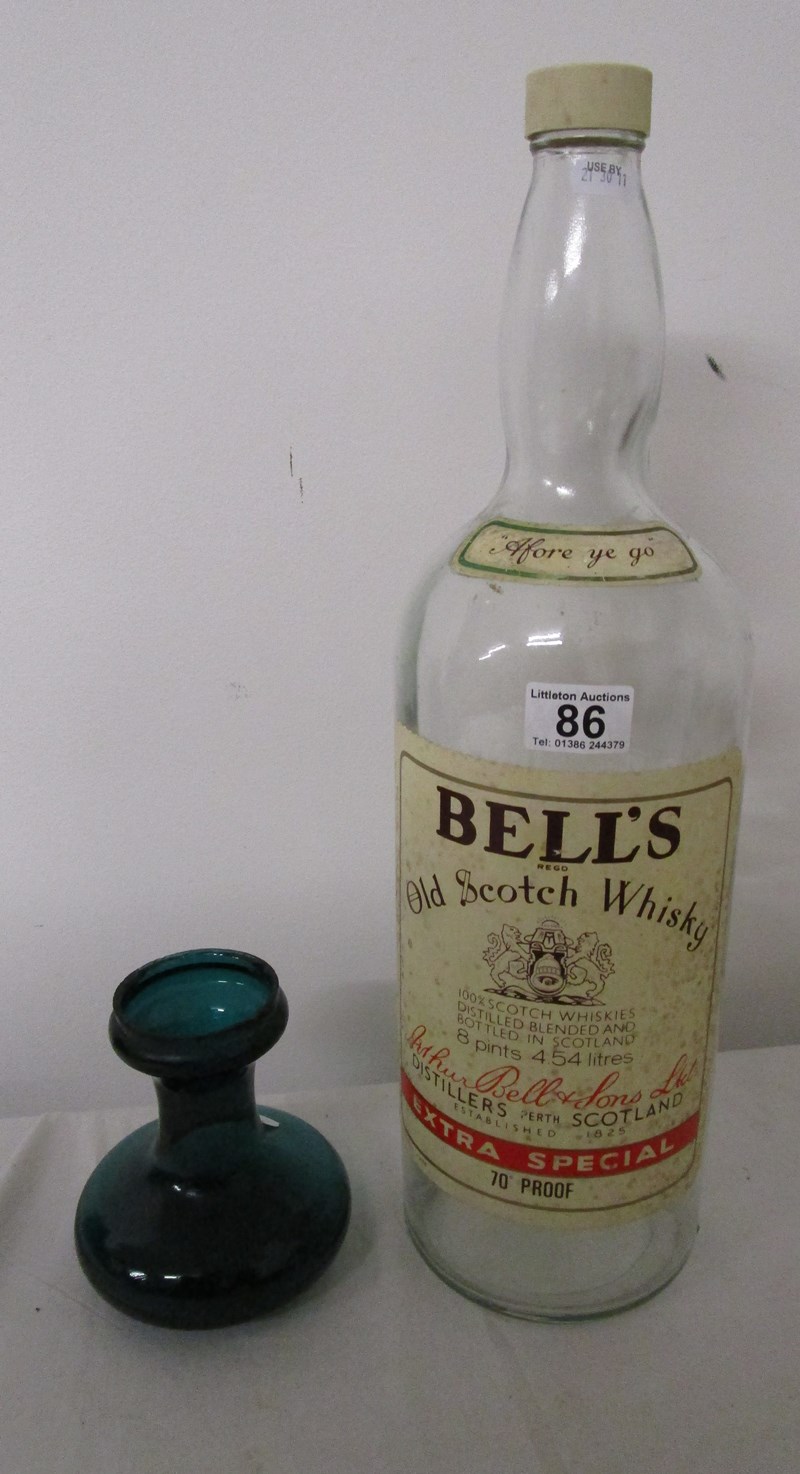 Large bells whisky bottle together with Victorian hyacinth glass vase