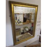 Gilt framed bevelled glass mirror