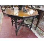 Octagonal occasional table on casters