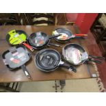 Collection of 10 new frying pans