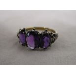 Gold 3 stone amethyst set ring