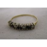 Gold stone set half hoop ring