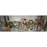 Shelf of metalware to include pair of copper jugs