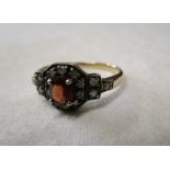 Gold garnet & diamond set ring