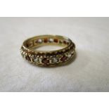 Gold garnet full eternity ring