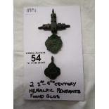 2 interesting third to fifth century heraldic pendants