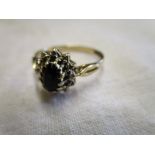 Gold sapphire and diamond cluster ring