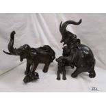 Metal elephants fighting lions figures