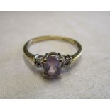 Gold amethyst and diamond set ring