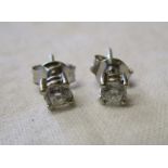 Pair of 18ct white gold diamond stud earrings