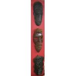 3 tribal carved masks