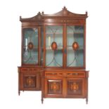 A pair of reproduction mahogany, satinwood banded and marquetry bookcases,