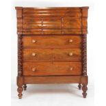 A 19th century mahogany chest of drawers, the top over a serpentine fronted drawer,