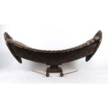 A modern Thai xylophone, the carved base in the form of a boat, with two mallets, h. 52 cm, l.