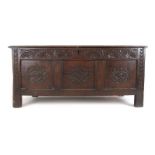 An 18th century oak coffer,