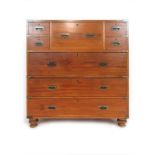 An early 20th century camphor wood and brass bound campaign style secretaire chest of drawers,