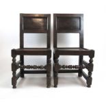 A pair of late 17th century oak side chairs,