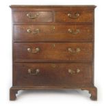 A late 18th century oak chest of drawers,