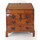 A mid 18th century oak bureau,