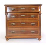 A 19th century style walnut and crossbanded continental chest of four long drawers,