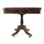 A Regency rosewood, brass inlaid and brass mounted card table,