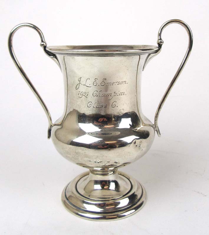 A George V silver twin handled trophy of baluster form, the body engraved 'J.L.E.