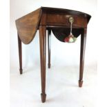 A late 18th century mahogany and ebony strung Pembroke table,