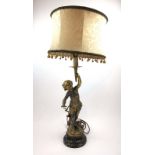 An early 20th century gold painted metal table lamp,