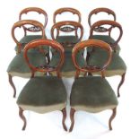 A set of eight Victorian mahogany balloon back dining chairs,