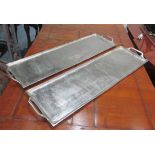 TRAYS, a pair, rectangular twin handled in a nickel plated finish, 88cm W x 25cm D.