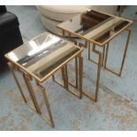 MIRRORED TOP NEST OF TABLES, two, gilt metal framed, the largest 45cm square x 64cm H.