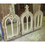 WALL MIRRORS, a set of three, Gothic style, each distressed wooden framed, 59cm W x 117cm H.