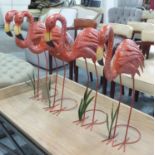 FLAMINGOS, a set of four stylised form, 71cm H.