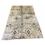 IKAT DESIGN RUG, 245cm x 150cm, hand knotted wool.