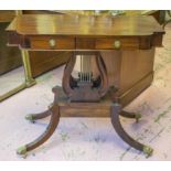 SIDE TABLE, Regency style hardwood with two drawers on lyre supports and brass castors,