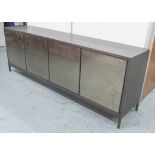 HENHAM CREDENZA, with four doors antique mirrored style on square supports internal shelves,