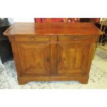BUFFET, 19th century French walnut with two short drawers over two panelled doors enclosing a shelf,